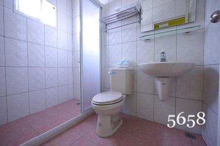Hua Qiao De Jia Apartamento Donggang Exterior foto