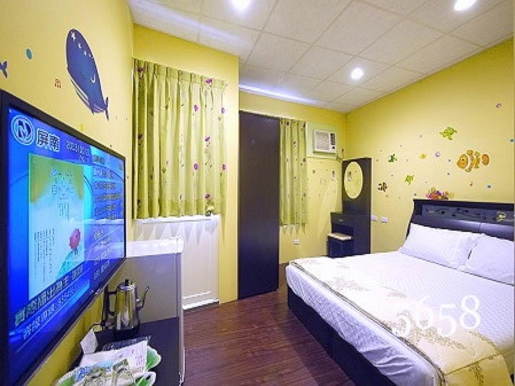 Hua Qiao De Jia Apartamento Donggang Exterior foto